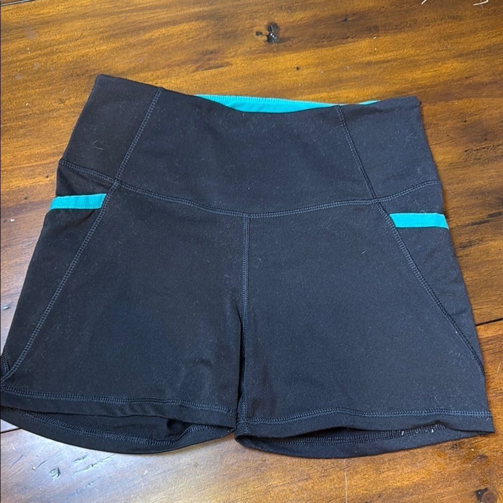 Marika Sport Black and Teal Athletic Compression Shorts with side pockets, Mediu